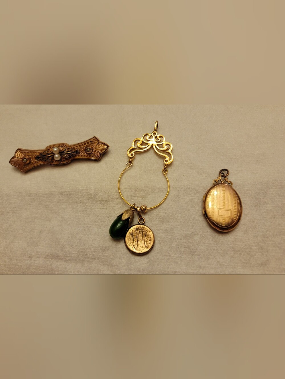 Vintage Gold-Toned Jewelry Lot - Brooch, Locket, and Pendant